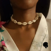 Collier coquillage cauri ovule, mode tribal Papouasie-Nouvelle-Guinée - Canada Collier coquillage cauri ovule, mode tribal Papouasie-Nouvelle-Guinée - Canada