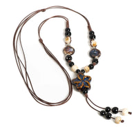 Pendentif Africain en Céramique ’Étoile’