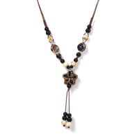 Pendentif Africain en Céramique ’Étoile’