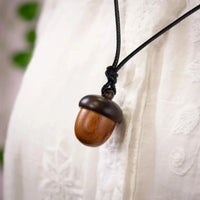 Pendentif Africain Noisette en Bois