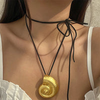 Pendentif Afrique en Or Coquillage