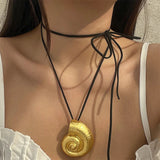 Pendentif Afrique en Or Coquillage
