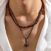 Pendentif Perle en Bois Africain